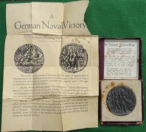 British Lusitania Medal 1915, iron, after Karl Goetz, in original box with propaganda leaflet